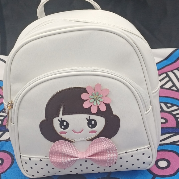 White Mini Backpack For girl wearing Pink Bow and Flower - Picture 8 of 8